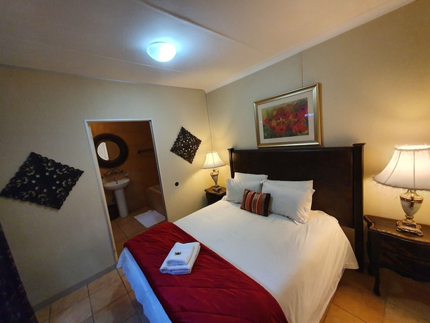 Imagen de la habitación del Hotel 7th Street Guesthouse. Foto 10