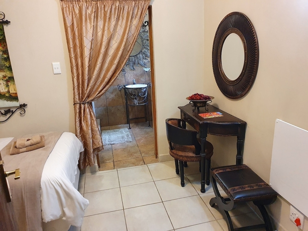 Imagen de la habitación del Hotel 7th Street Guesthouse. Foto 12