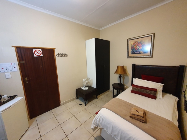 Imagen de la habitación del Hotel 7th Street Guesthouse. Foto 13