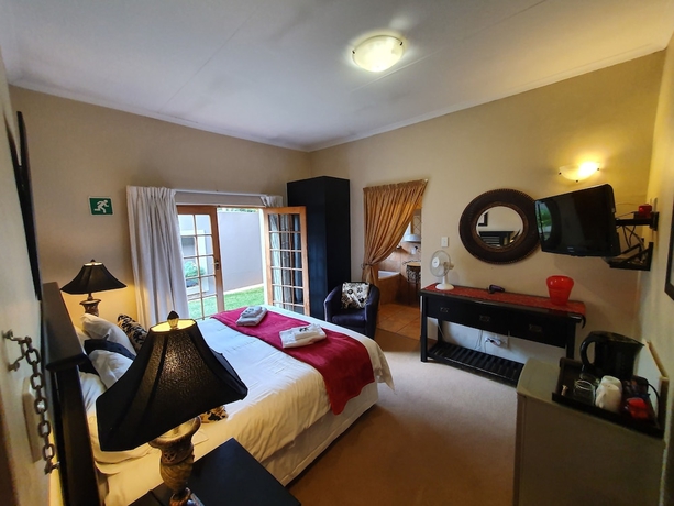 Imagen de la habitación del Hotel 7th Street Guesthouse. Foto 14