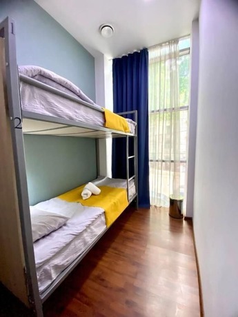 Imagen de la habitación del Hotel 8 Queen Tamar Ave. Foto 18