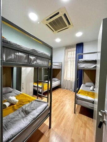 Imagen de la habitación del Hotel 8 Queen Tamar Ave. Foto 19