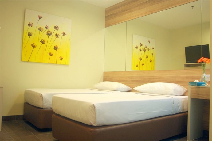 Imagen de la habitación del Hotel 81 Dickson. Foto 8