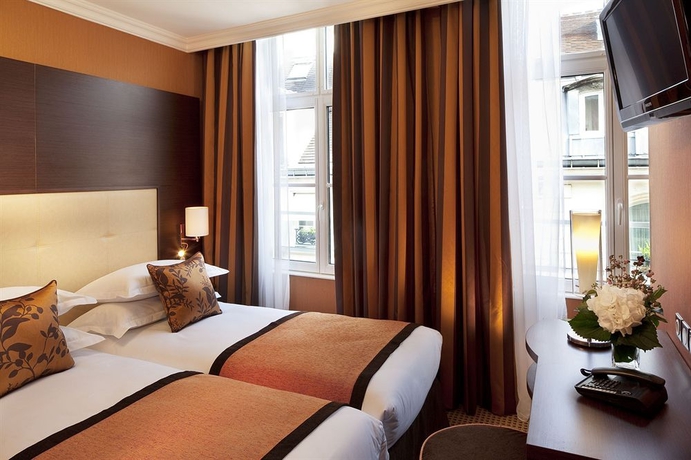 Imagen de la habitación del Hotel 85 Saint Honore. Foto 9