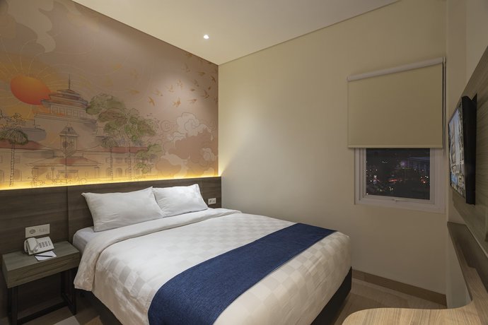 Imagen de la habitación del Hotel 88 Alun Alun. Foto 8