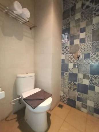 Imagen de la habitación del Hotel 88 Alun Alun. Foto 11