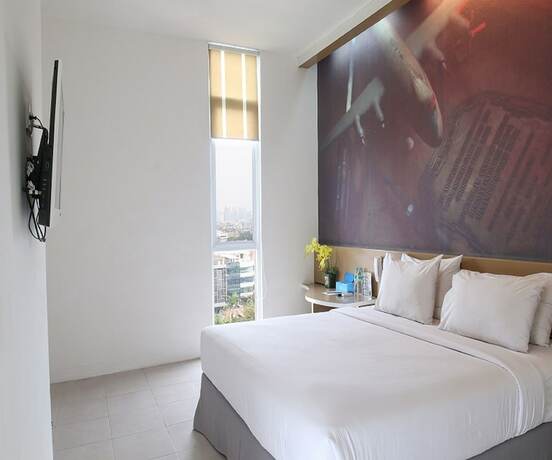 Imagen de la habitación del Hotel 88 Kedoya Jakarta. Foto 19