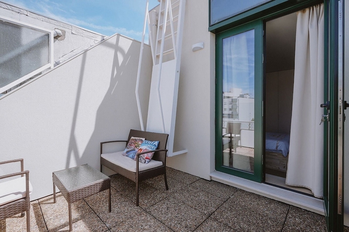 Imagen de la habitación del Hotel 888hostelandsuites. Foto 15