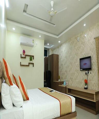 Imagen de la habitación del Hotel 8th Mile Suites. Foto 8