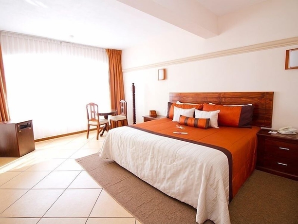 Imagen de la habitación del Hotel 9 Manantiales. Foto 4