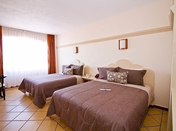 Imagen de la habitación del Hotel 9 Manantiales. Foto 6