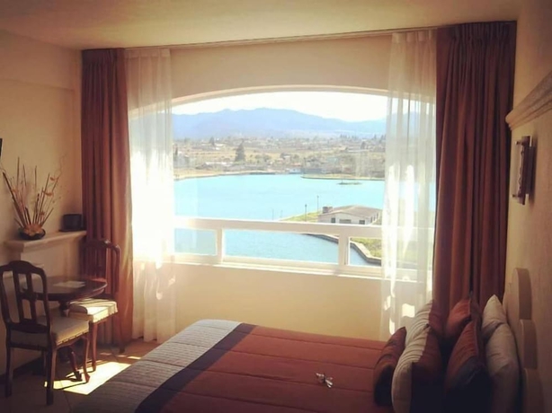 Imagen de la habitación del Hotel 9 Manantiales. Foto 10