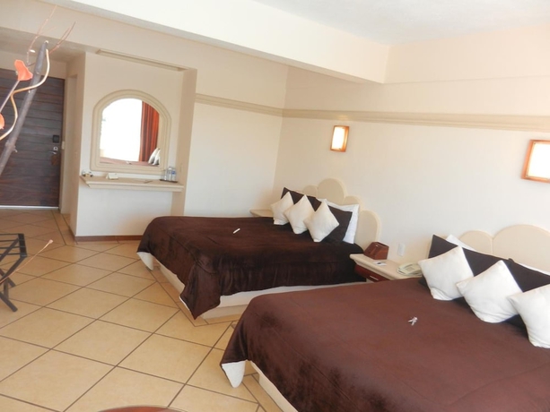 Imagen de la habitación del Hotel 9 Manantiales. Foto 11