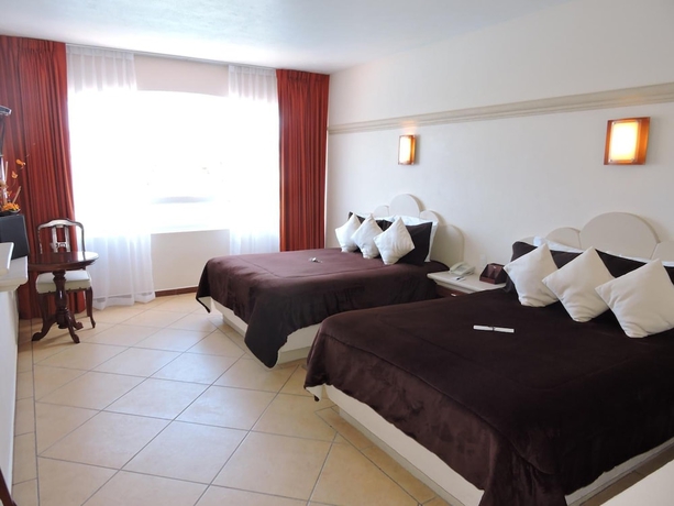 Imagen de la habitación del Hotel 9 Manantiales. Foto 12