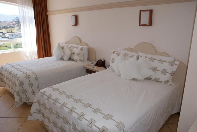 Imagen de la habitación del Hotel 9 Manantiales. Foto 13