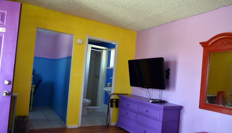 Imagen de la habitación del Hotel 9 Palms Inn. Foto 12