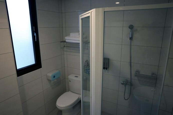 Imagen de la habitación del Hotel 9 Tan Yuan Homestay. Foto 19