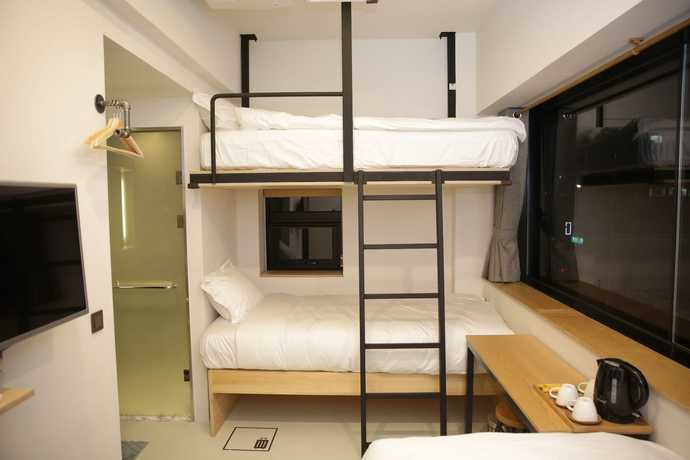 Imagen de la habitación del Hotel 96 BUN'Z Travelers Lodge. Foto 7
