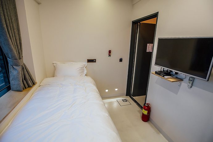 Imagen de la habitación del Hotel 96 BUN'Z Travelers Lodge. Foto 9