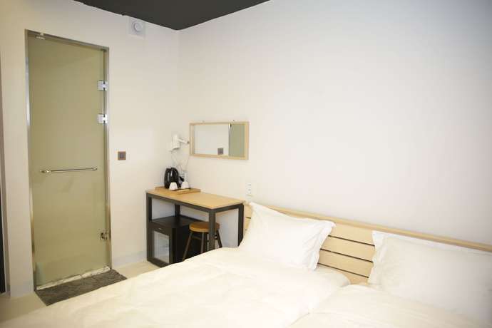 Imagen de la habitación del Hotel 96 BUN'Z Travelers Lodge. Foto 12