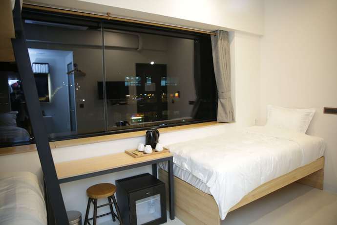 Imagen de la habitación del Hotel 96 BUN'Z Travelers Lodge. Foto 13
