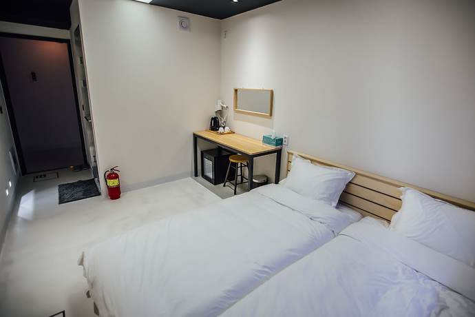 Imagen de la habitación del Hotel 96 BUN'Z Travelers Lodge. Foto 17