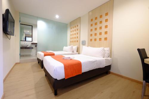 Imagen de la habitación del Hotel 98. Foto 16