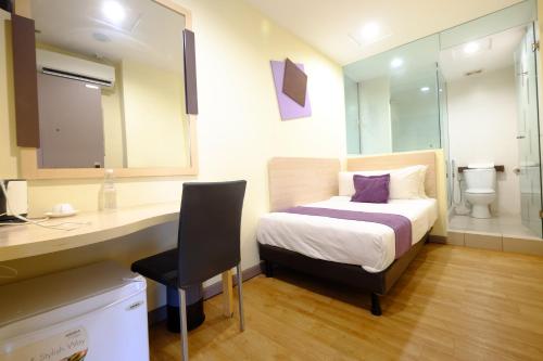 Imagen de la habitación del Hotel 98. Foto 18