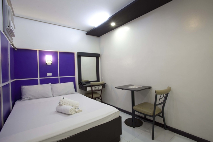 Imagen de la habitación del Hotel 99 Cubao. Foto 5
