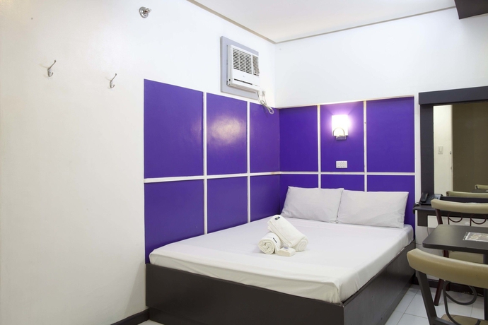 Imagen de la habitación del Hotel 99 Cubao. Foto 9