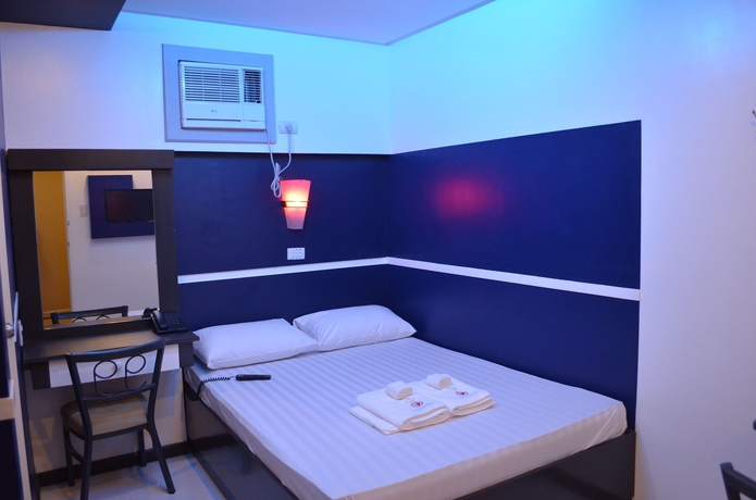 Imagen de la habitación del Hotel 99 Cubao. Foto 10