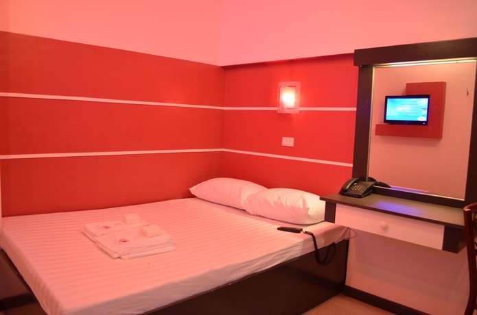 Imagen de la habitación del Hotel 99 Cubao. Foto 11