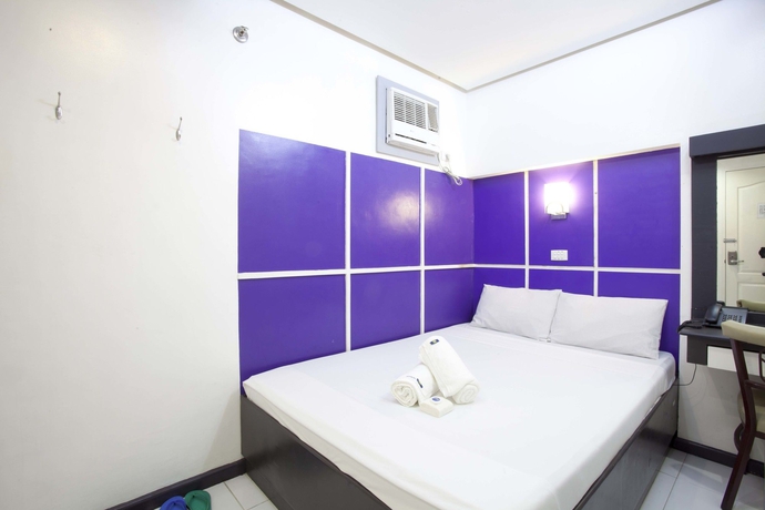 Imagen de la habitación del Hotel 99 Cubao. Foto 14