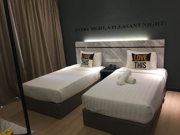 Imagen de la habitación del Hotel 99 Sepang Klia. Foto 16