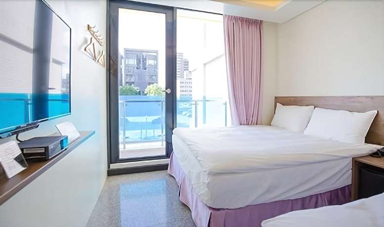 Imagen de la habitación del Hotel 99, Taichung. Foto 3