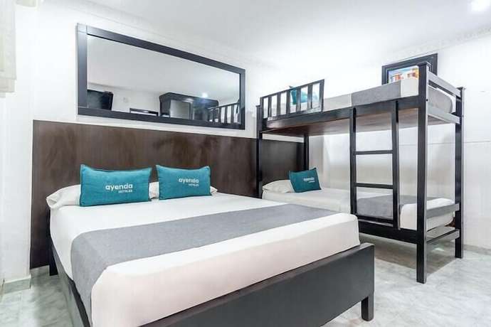 Imagen de la habitación del Hotel 999. Foto 4