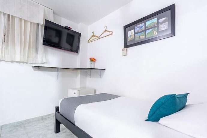 Imagen de la habitación del Hotel 999. Foto 5