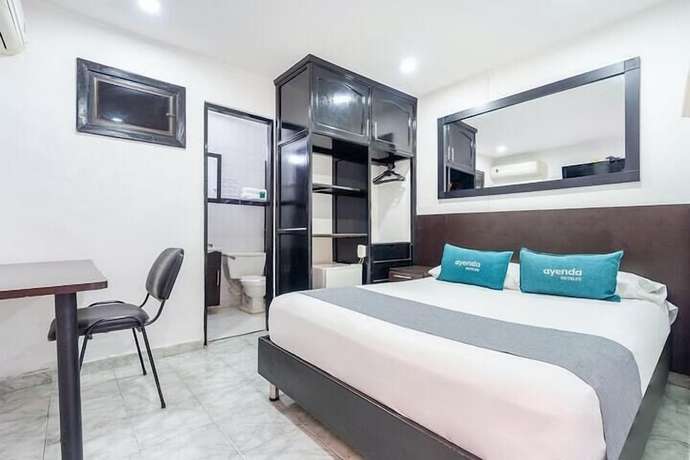 Imagen de la habitación del Hotel 999. Foto 7