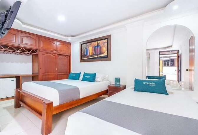 Imagen de la habitación del Hotel 999. Foto 8