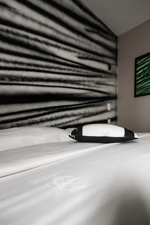 Imagen de la habitación del Hotel 9hotel Paquis. Foto 12