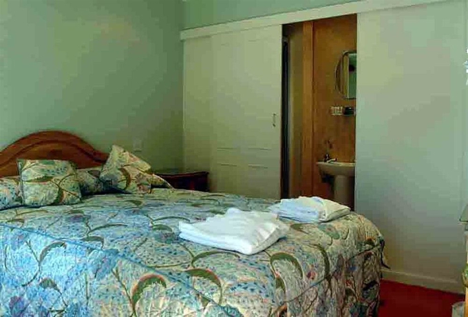 Imagen de la habitación del Hotel A Haven Townhouse. Foto 2