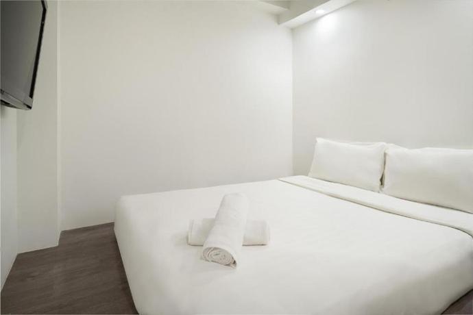 Imagen de la habitación del Hotel A Hotel Dickson. Foto 3