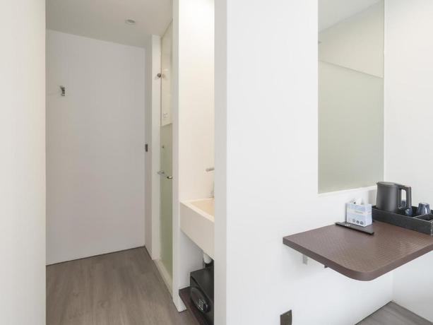 Imagen de la habitación del Hotel A Hotel Dickson. Foto 4