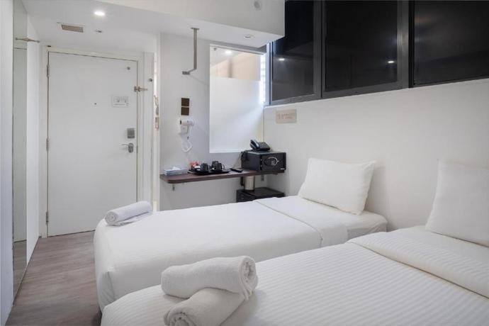 Imagen de la habitación del Hotel A Hotel Dickson. Foto 12