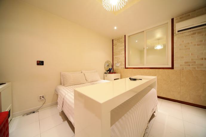 Imagen de la habitación del Hotel A Iksan. Foto 2