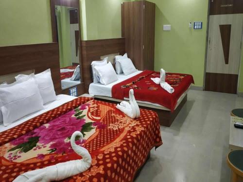 Imagen de la habitación del Hotel A- International Digha. Foto 18