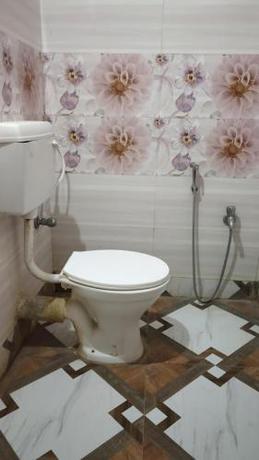 Imagen de la habitación del Hotel A- International Digha. Foto 19