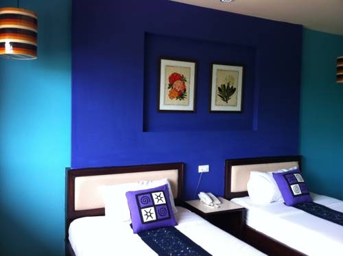 Imagen de la habitación del Hotel A Mansion Hotel. Foto 28