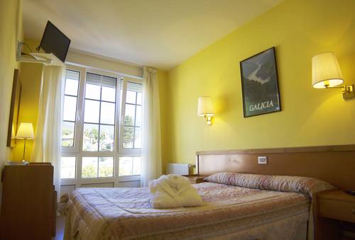 Imagen de la habitación del Hotel A Pedra, Carino. Foto 9