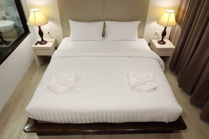 Imagen de la habitación del Hotel A Plus Deluxe. Foto 6